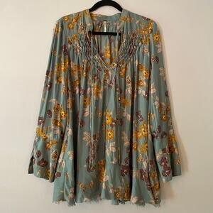 Free People So Fine Smocked Blue Floral Butterfly Flowy Blouse Women size Medium